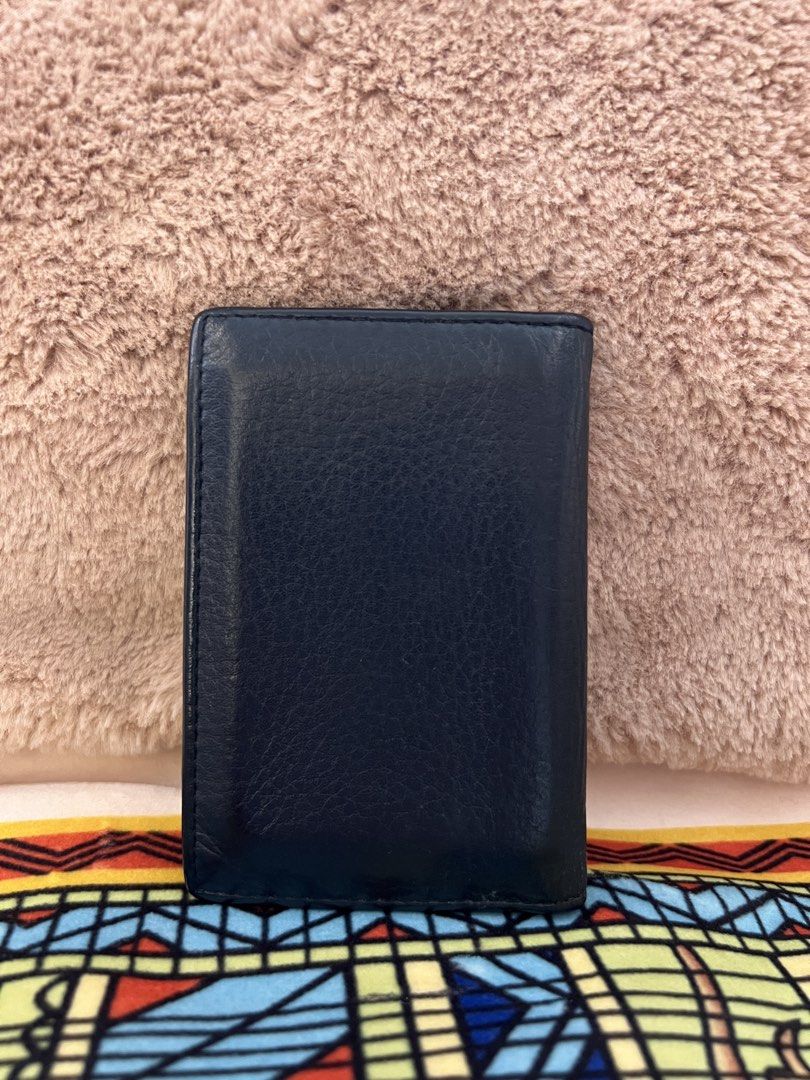 AUTHENTIC PRADA Milano Dark Blue Leather Card Holder (Category: Luxury Bags & Wallets) located in Cavite. Submitted by charmscloset888 (Listing ID 1459753199, Image 3). Description: PRADA Milano Dark Blue Leather Card Holder ₱ 6,500 A classic PRADA Milano card holder in rich dark blue textured leather, featuring the signature raised PRADA lettering in silver-tone hardware. 💙 ✨ Authentic PRADA Milano ✨ Dark blue textured leather ✨ Multiple card s