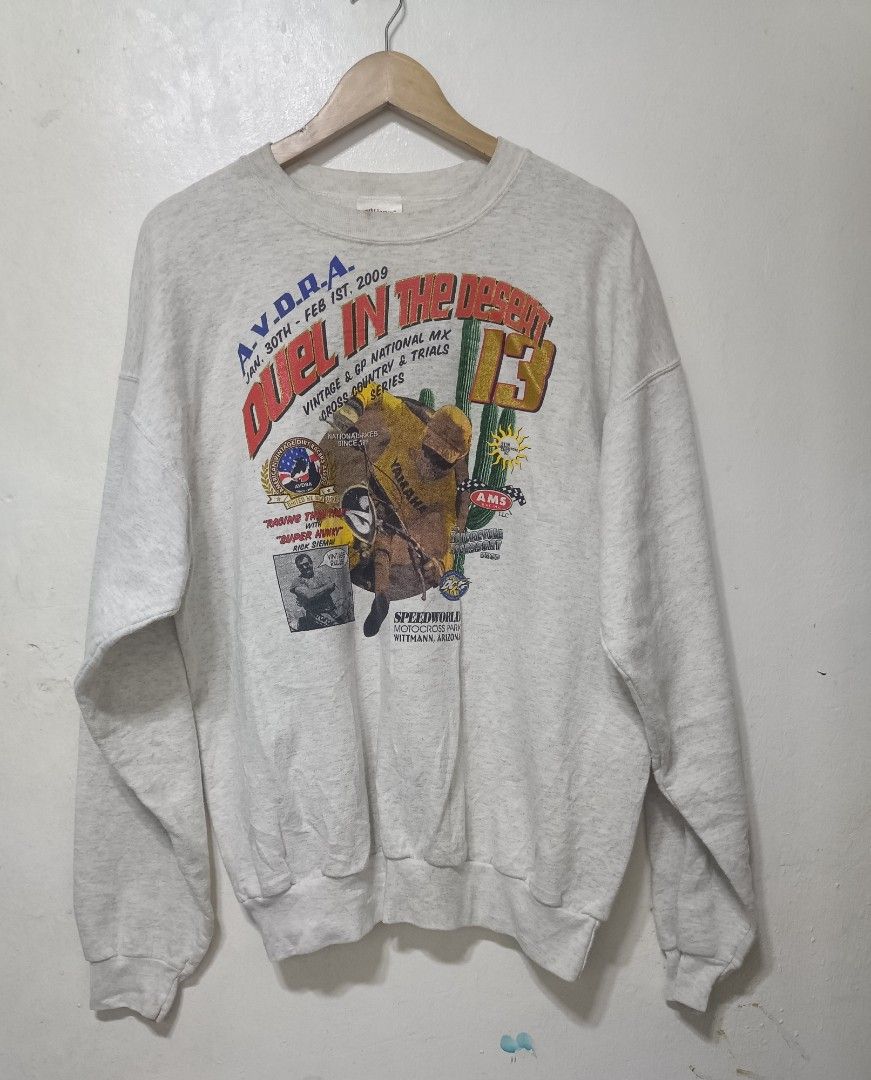 AVDAA 2009 long sleeve shirt (Category: Coats, Jackets and Outerwear) located in Muntinlupa City. Submitted by kamiseta01 (Listing ID 1459729329, Image 1). Description: a vintage gray crewneck sweatshirt featuring a colorful graphic for the A.V.D.A.A. "Duel in the Desert 13" vintage and GP national motocross, cross-country, and trials event held from January 30 to February 1, 2009. 23 by 28 dimes details posted.