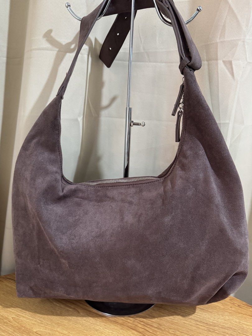 AZTRID Suede Hobo Bag (Category: Shoulder Bags) located in Quezon City. Submitted by areux (Listing ID 1459773723, Image 2). Description: A roomy and stylish everyday bag with a soft suede-like finish and adjustable strap. The neutral gray-brown/taupe shade is easy to pair with almost any outfit, whether casual or dressed up. ✨ Features: • Large hobo/sling bag design • Can be worn as a shoulder or crossbody bag • Adjustable strap with multiple ho
