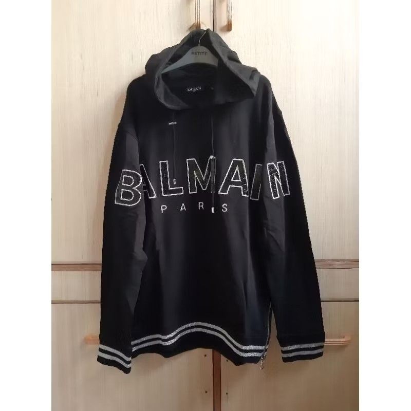 Balmain hoodie black large/xl (Category: Coats, Jackets and Outerwear) located in Quezon City. Submitted by tchalamett (Listing ID 1459807475, Image 1). Description: balmain hoodie black large & xl authentic from u.k. brandnew with tag in. - width in. - lenght.