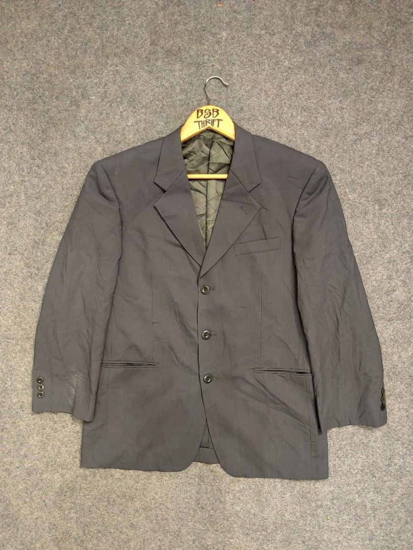 Balmain Paris Suit Blazer (Category: Luxury Apparel) located in Cordova. Submitted by bsb.streetluxvintage.clothing (Listing ID 1459791862, Image 1). Description: - Authentic Balmain Paris blazer - Elegant dark grey color - Classic three-button closure - Two functional front pockets - Signature Balmain Paris engraved buttons - Interior lined with iconic Balmain Paris pattern - Perfect for both formal events and casual styling.
