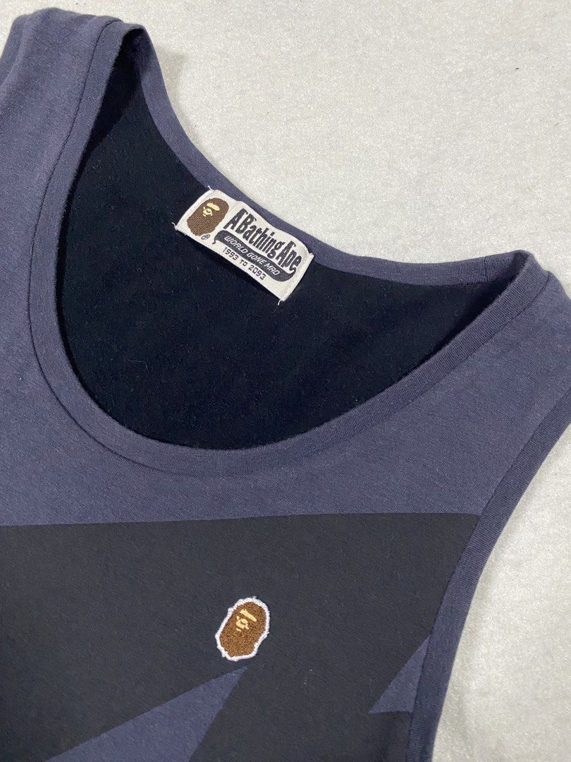 Bape Layered Sleeve less tops (Category: Dresses) located in Dasmarinas. Submitted by ridgeridethrift (Listing ID 1459845897, Image 3). Description: A Bathing Ape layered sleeveless top featuring Iconic STA and an asymmetrical hem. Measurements: Chest - 15 Width- 21 Length - 31.5 Item Description : 1500+ shipping fee Dm to purchase 📥.
