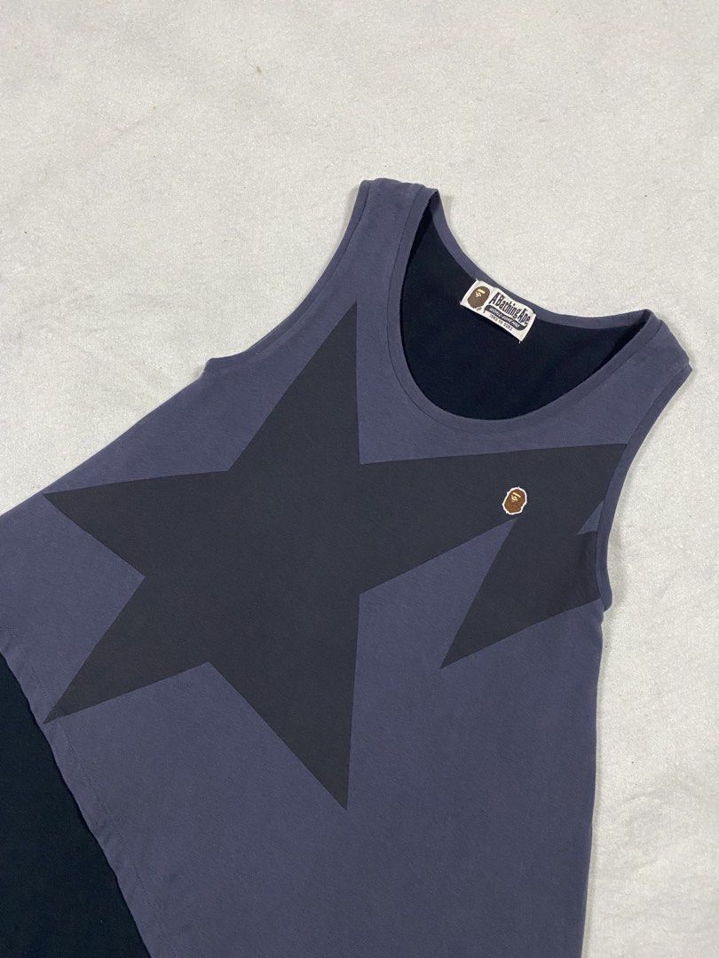 Bape Layered Sleeve less tops (Category: Dresses) located in Dasmarinas. Submitted by ridgeridethrift (Listing ID 1459845897, Image 2). Description: A Bathing Ape layered sleeveless top featuring Iconic STA and an asymmetrical hem. Measurements: Chest - 15 Width- 21 Length - 31.5 Item Description : 1500+ shipping fee Dm to purchase 📥.