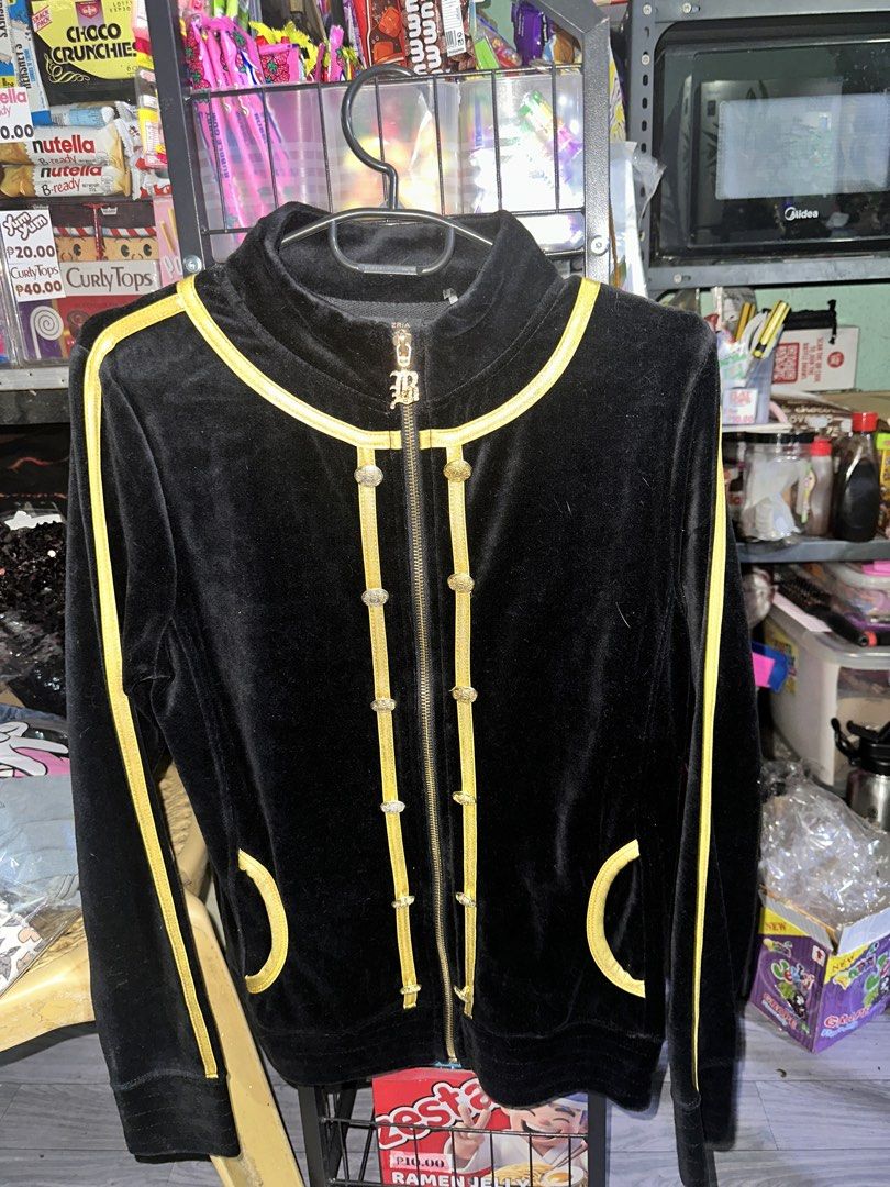 BCBGMAXAZRIA Black Velour Jacket with Gold Trim (Category: Coats, Jackets and Outerwear) located in Manila. Submitted by edgiedge (Listing ID 1459865688, Image 2). Description: - Brand: BCBGMAXAZRIA - Material: Black Velour - Size: S - Design: Gold trim details - Back Detail: Large ornate cross with 'BCBG' lettering - Closure: Zip-up front with decorative buttons - Pockets: Front pockets ₱100 Tondo, Manila.