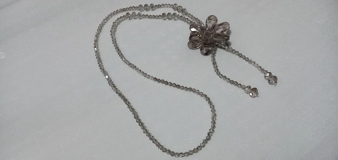 Beaded Necklace with Flower Pendant (Category: Necklaces) located in Paranaque City. Submitted by zuprocsejon38604 (Listing ID 1459721549, Image 3). Description: - Delicate beaded necklace with a subtle sparkle. - Features a pretty flower pendant at the center. - Made with small, clear beads and a faceted bead pendant. - Ideal for everyday wear or to elevate any outfit. - Wonderful gift idea..