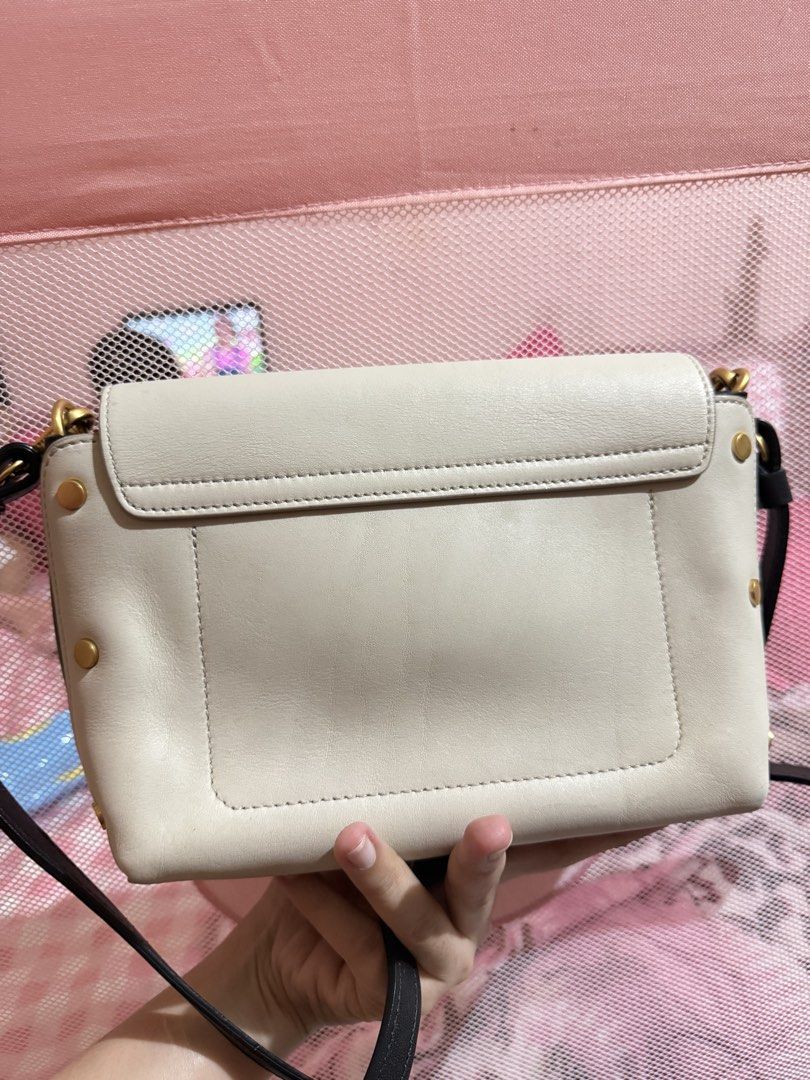 BEANPOLE white Leather Crossbody Bag (Category: Cross-body Bags) located in Obando. Submitted by rizellejen (Listing ID 1459756030, Image 2). Description: - Cream leather crossbody bag by Beanpole - Elegant gold hardware details - Convenient interior card slot - Secure magnetic snap closure - Adjustable strap for comfortable wear - Versatile for daily use or nights out - Interior and exterior are clean.