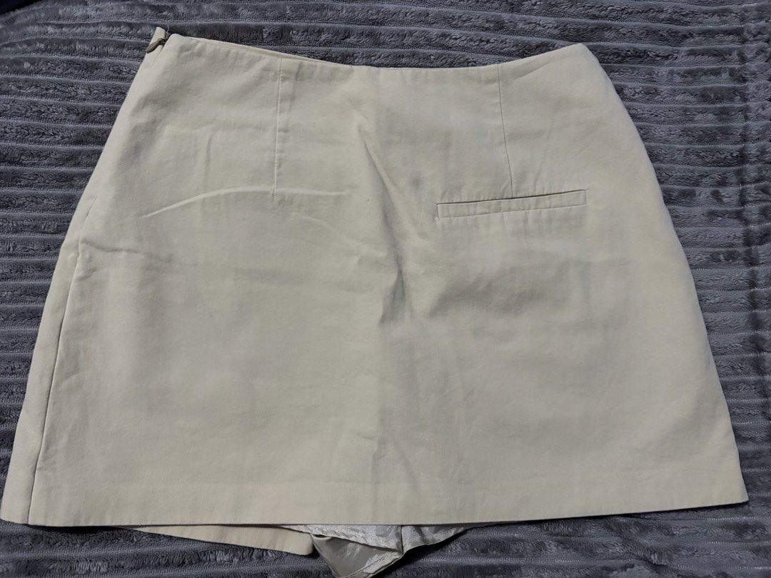Beige Canvas Apron with Pocket and Adjustable Strap (Category: Other Bottoms) located in San Pedro. Submitted by princessjybc (Listing ID 1459822050, Image 2). Description: FOR SALE: Zara Beige Skort ✨ Size: Xsmall ✨ Condition: Lightly used 📸 May request for actual photos and measurements. Just send me a message! 📍 Location: San Pedro, Laguna .