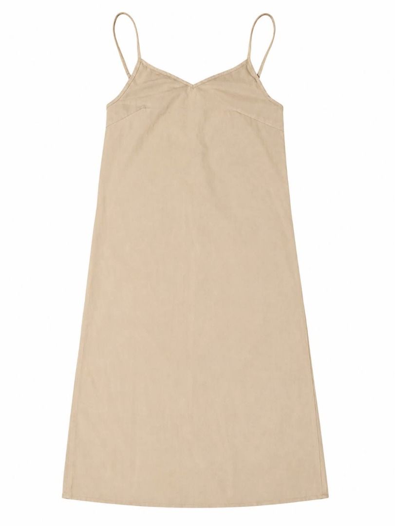 Beige Spaghetti Strap Midi Dress#8 (Category: Dresses) located in Caloocan City. Submitted by outfitloop (Listing ID 1459792466, Image 2). Description: - Simple beige midi dress - Spaghetti straps - Flattering V-neckline IMPORTANT: • 1st photo is an AI styling/model preview for reference on how the item may look when worn. • Please refer to the actual photos for the item’s true appearance and condition. • Color may slightly vary due to lighting, 