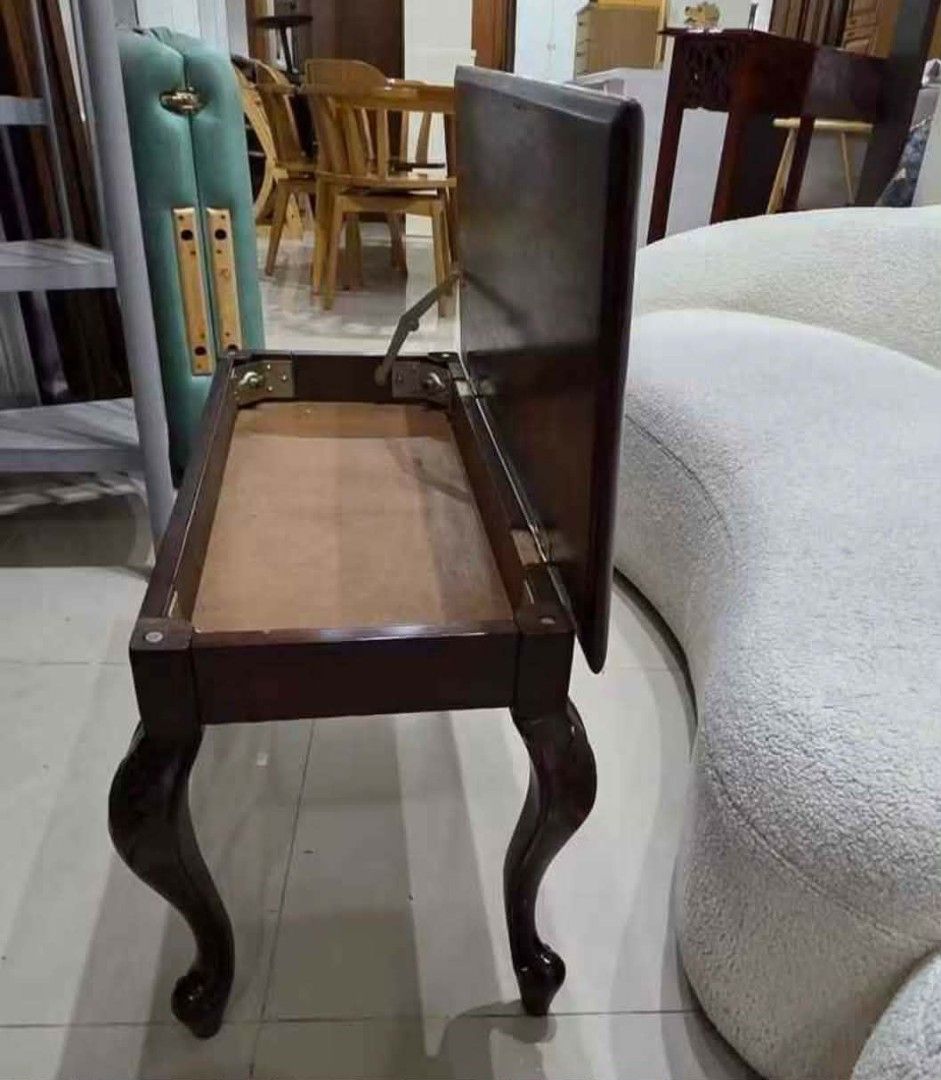 Bench or centertable (Category: Other Home Furniture) located in Las Pinas. Submitted by jenny.nogu (Listing ID 1459725672, Image 3). Description: 9/10 condition Laspiñas area dark wood coffee table / bench / piano chair with storage.