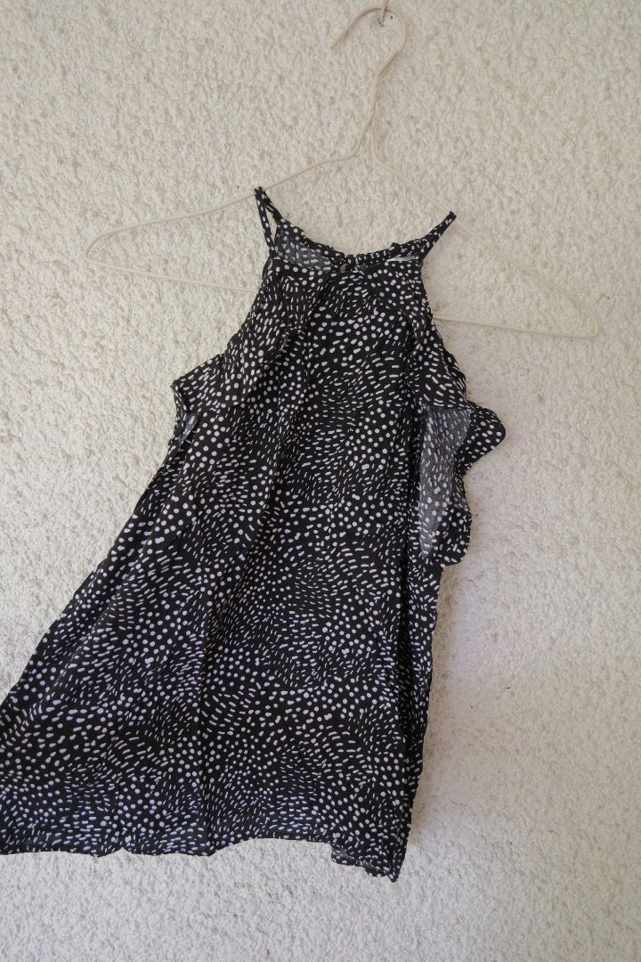 Black and White Patterned Cold Shoulder Top (Category: Blouses) located in Caloocan City. Submitted by kccloset_ (Listing ID 1459799408, Image 2). Description: Cute black and white patterned top. It has a cold shoulder design with ruffled sleeves. The straps are thin and adjustable. The fabric is lightweight and flowy. Great for a casual day out or a night out with friends. Easy to pair with jeans or shorts..