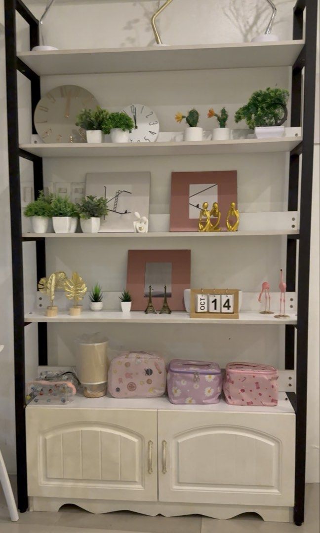 Black and white shelf and storage (Category: Shelves, Cabinets & Racks) located in San Juan City. Submitted by lovegoeson (Listing ID 1459864341, Image 1). Description: .