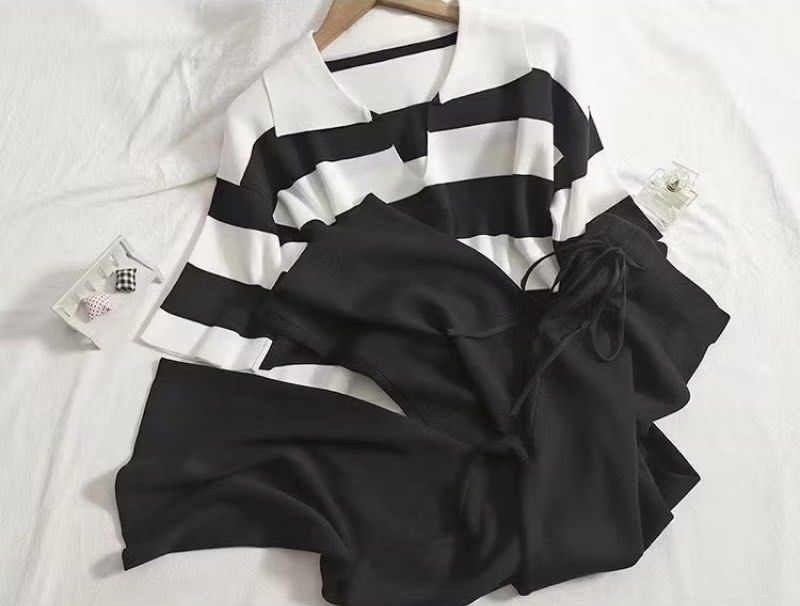 Black and White Striped Collared Pajama Set (Category: Undergarments & Loungewear) located in Quezon City. Submitted by cess.adams (Listing ID 1459802056, Image 1). Description: - M - L size - Good as new - No Issue/Flaws - Cozy knit pajama set - Collared top with short sleeves - Wide-leg pants with elastic waistband and drawstring - Ideal for lounging at home or casual outings - Easy to wear and wash .