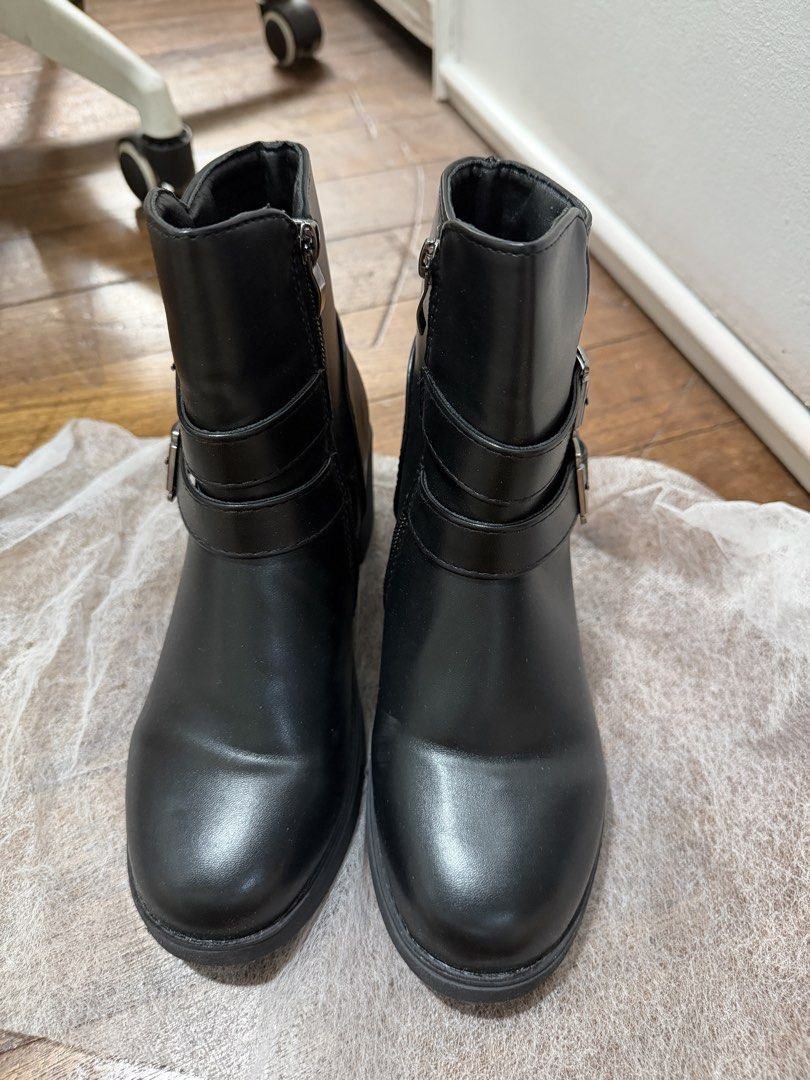 Black Belted Boots (Category: Boots) located in Manila. Submitted by niks_preloved (Listing ID 1459734233, Image 1). Description: Black Belted Boots made with soft PU leather good for everyday wear! Used once only for a party. Size: 23cm but fits 22cm feet too! BRAND: Lovito but this item is already sold-out in the Orange app! .