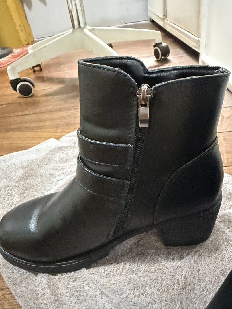 Black Belted Boots (Category: Boots) located in Manila. Submitted by niks_preloved (Listing ID 1459734233, Image 3). Description: Black Belted Boots made with soft PU leather good for everyday wear! Used once only for a party. Size: 23cm but fits 22cm feet too! BRAND: Lovito but this item is already sold-out in the Orange app! .