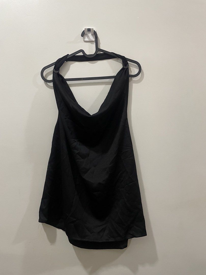 Black Halter Neck Top (Category: Sleeveless) located in Binan City. Submitted by dearlouise (Listing ID 1459851501, Image 1). Description: - Black halter neck top - Elegant cowl neck design - Comfortable elasticated waist - Made from lightweight fabric - Ideal for going out or casual wear - Effortlessly pairs with jeans or skirts.