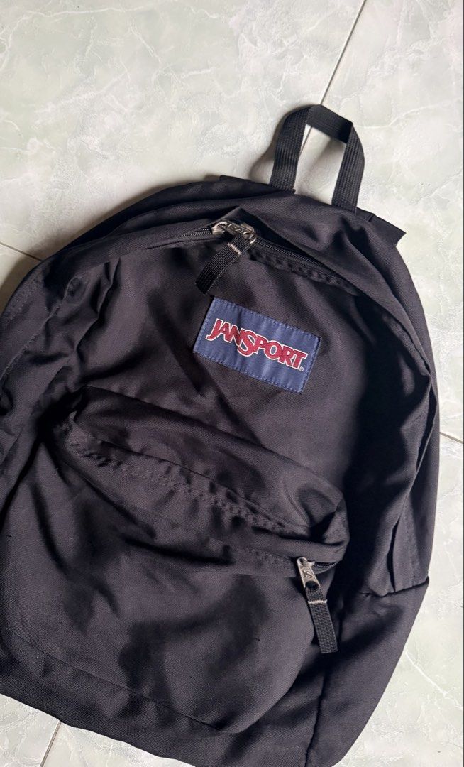 Black Jansport Backpack (Category: Backpacks) located in General Santos City (Dadiangas). Submitted by ssssshhhhhhhhh (Listing ID 1459798577, Image 2). Description: - Classic black Jansport backpack - Main compartment and front pocket with zipper closures - Durable material - Plenty of life left - Ideal for school or everyday use .