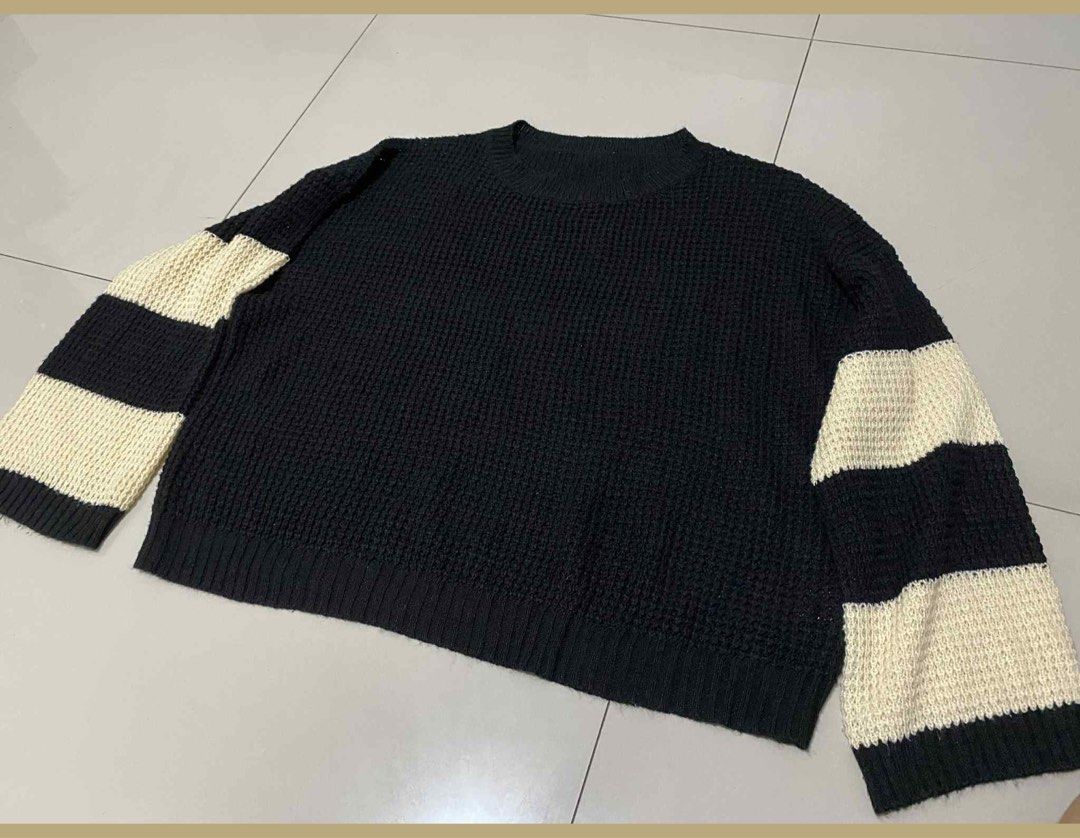 Black Knit Sweater with Striped Sleeves (Large) (Category: Longsleeves) located in Cainta. Submitted by mrdlpr (Listing ID 1459894898, Image 2). Description: Black Knit Sweater with Stripped Sleeves - size: L-XL - good for oversized look RFS: decluttering ‼️ CHECK PROFILE FOR MORE LOW PRICED CLOTHES FOR DECLUTTERING‼️.