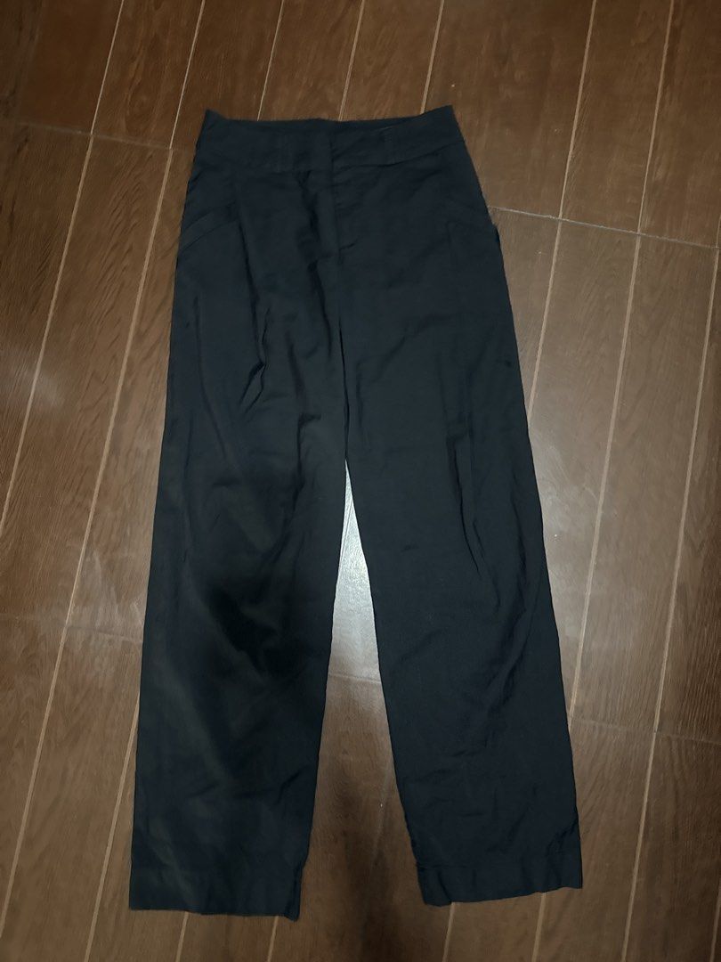 Black Wide Leg Trousers (Category: Other Bottoms) located in Antipolo. Submitted by pinkescee (Listing ID 1459755422, Image 3). Description: - will fit 24 to 25 waistline - originally size 8 but altered for up to 24-25” waistline - Stylish black straight cut trouser - Elegant front pleats - Functional pockets - Made from smooth, lightweight fabric - Versatile: dress up or down - A wardrobe essential!.