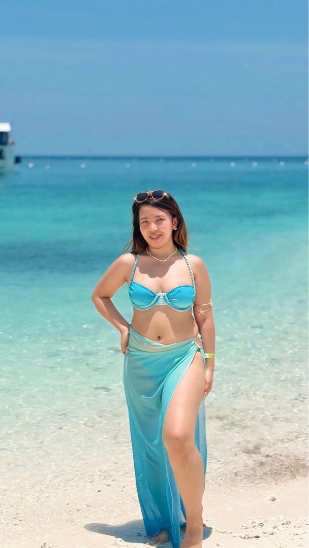 Blue Ombre Bikini Set with Matching Sarong (Category: Bikinis & Swimsuits) located in Caloocan City. Submitted by zandrarubio (Listing ID 1459725348, Image 3). Description: - Super cute blue ombre bikini set - Matching sheer sarong that ties at the waist - Beautiful gradient fabric (deep blue to turquoise) - Braided straps on bikini top - Clasp closure for secure fit - Lightweight and flowy sarong.