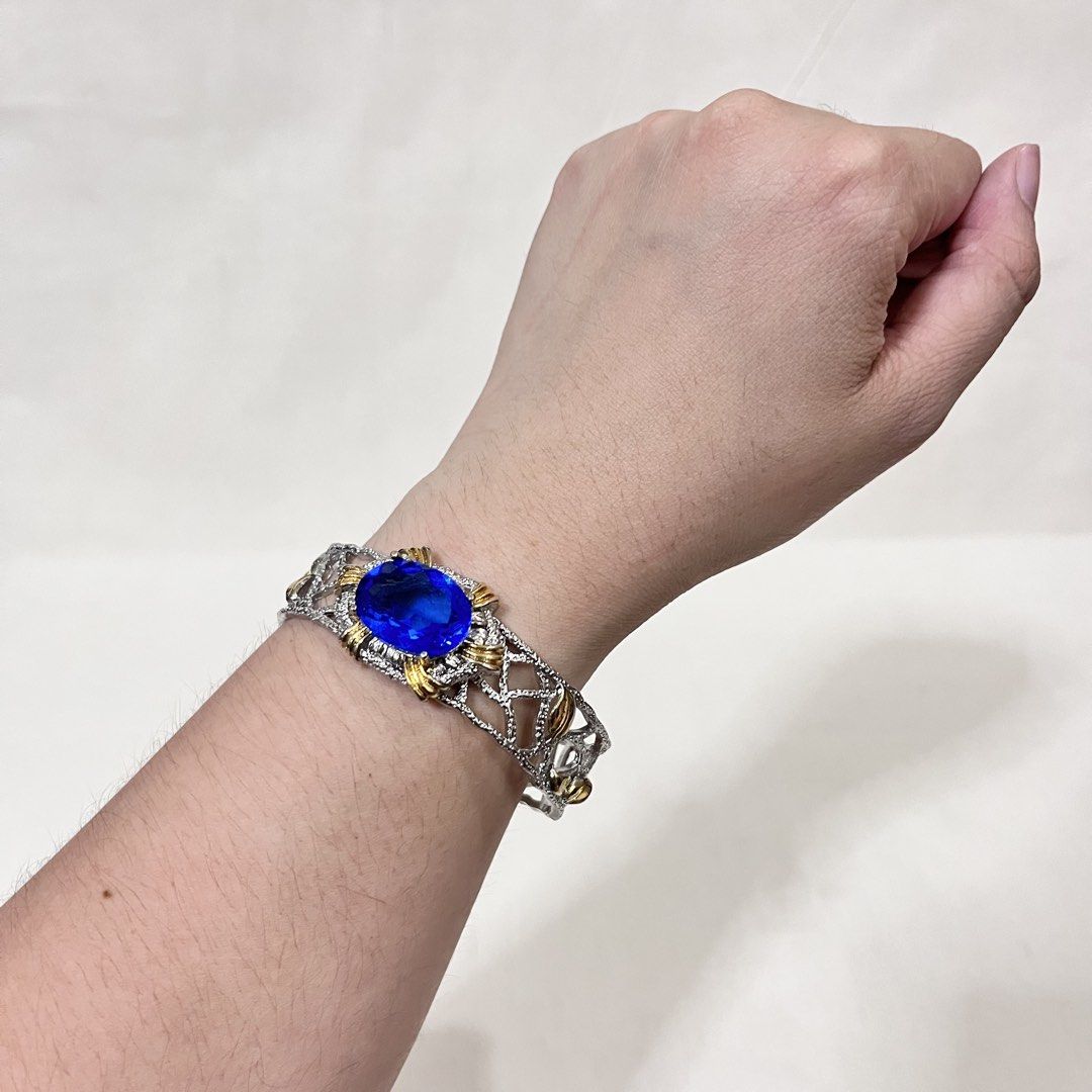 Blue Zircon Gemstone Fashion Accessory Adjustable Stainless Bangle (Category: Bracelets) located in Antipolo. Submitted by aristokai (Listing ID 1459849922, Image 2). Description: ❤️ Super pretty adjustable bangle ❤️ Perfect for special occasions or for performances ❤️ Can fit many wrist sizes, and super pretty when worn.