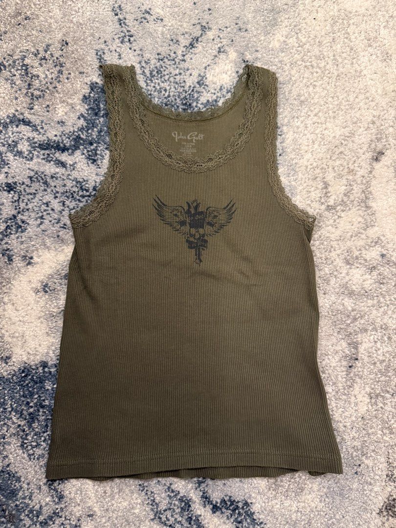 Brandy Melville Navy Green Graphic Top (Category: Sleeveless) located in Manila. Submitted by ell4scloset (Listing ID 1459869419, Image 1). Description: -used once - bought from brandy hawaii - so cute! Love the navy green sm dont mind keeping if unsold - will come w brandy stickers Rfs: decluttering .