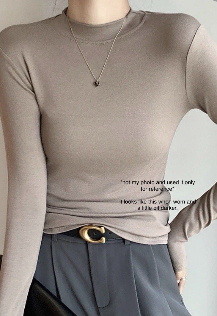 Brown Fitted Turtleneck Long Sleeve Top (Category: Longsleeves) located in Manila. Submitted by declutwtlu_ (Listing ID 1459769901, Image 3). Description: RS: Decluttering (Never worn) Area: Sampaloc, Manila Payment: GCash, payment first Shipping: Angkas, Move It, and lalamove only Shipping fee: Paid by buyer - Basic brown long-sleeved top - Comfortable turtleneck design - Made from soft fabric, ideal for layering - Snug, flattering fit - Versati