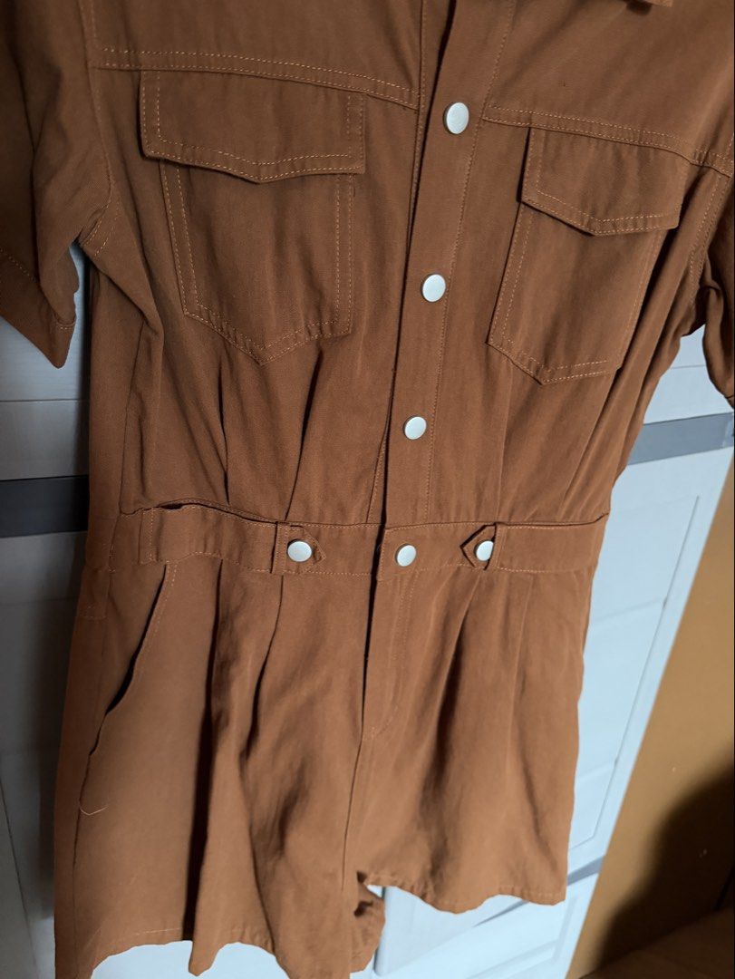 Brown Romper (Category: Rompers) located in Tarlac. Submitted by amclino (Listing ID 1459729396, Image 3). Description: Large on tag Waist: 28-30 garterized at the back Dark brown in actual (looks lighter due to lighting) Bought this at SM dep store for 1k + .