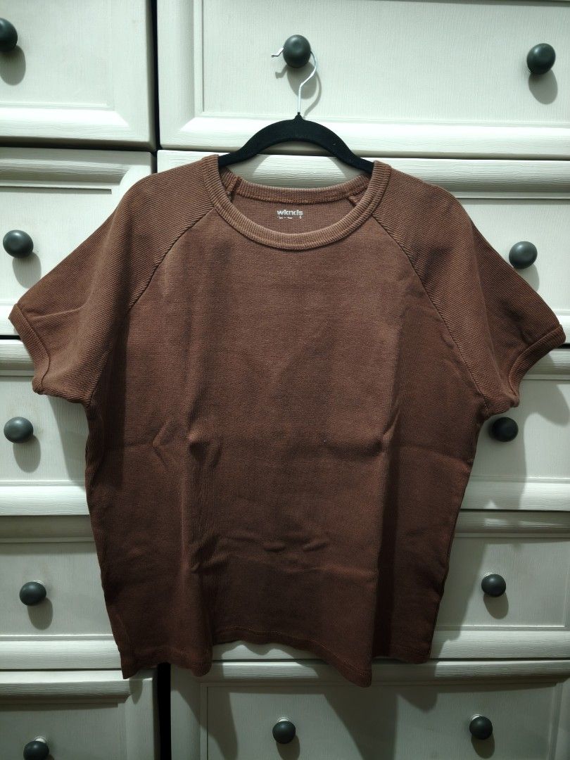 Brown Wknd T-shirt (Category: Tshirts & Polo Shirts ) located in Makati City. Submitted by atanghal (Listing ID 1459848767, Image 1). Description: - Brand: Wknd. - Color: Brown - Sleeve Type: Short-sleeved, Raglan sleeves - Fabric: Textured - Estimated Size: M - Occasion: Casual wear.