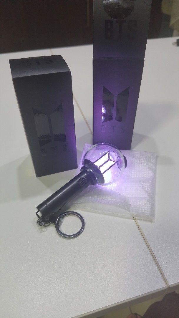 BTS Official Light Stick Keyring Ver.4 (Category: K-Wave Merchandise) located in Mandaluyong City. Submitted by grashalalala (Listing ID 1459846563, Image 1). Description: - BTS Official Light Stick Keyring Ver.4 - Lights up - Sealed, official BTS merch - A must-have for any ARMY - Cute and collectible accessory .