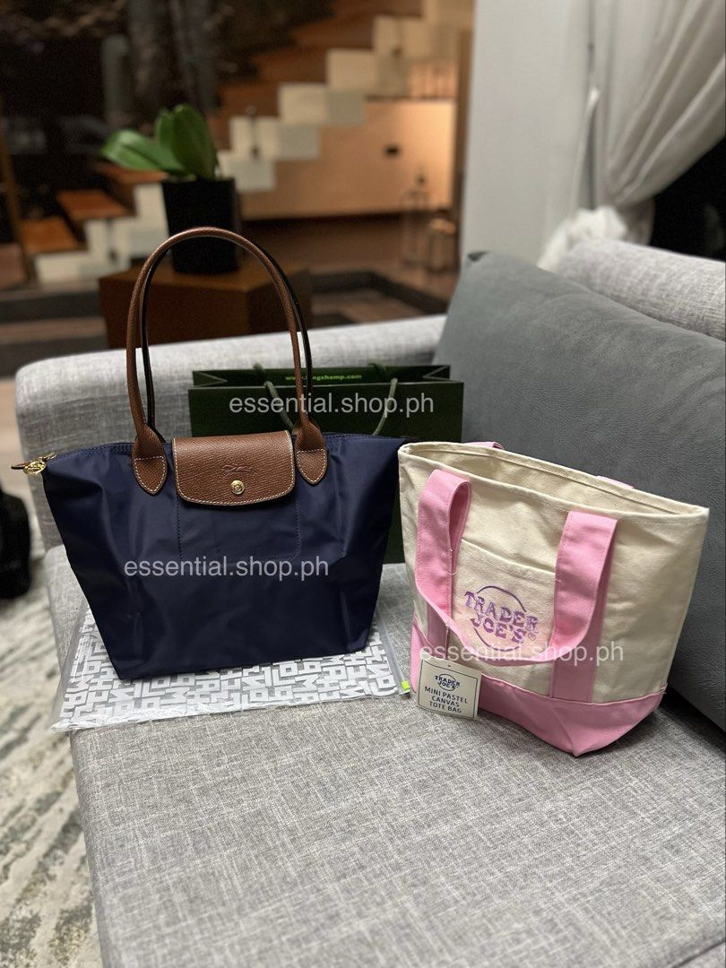 Bundle Promo! Longchamp Le Pliage Original Medium Long Handle Navy (Category: Luxury Bags & Wallets) located in Manila. Submitted by essential.shop.ph (Listing ID 1458019407, Image 1). Description: ON HAND ***Limited promo! Get a Trader Joe’s Pastel Tote with your purchase until Sept. 31, 2026 or until stocks last. Whichever comes first. Authentic Longchamp Le Pliage Original Medium Long Handle Navy Includes care card, LGP zip lock pouch and pape