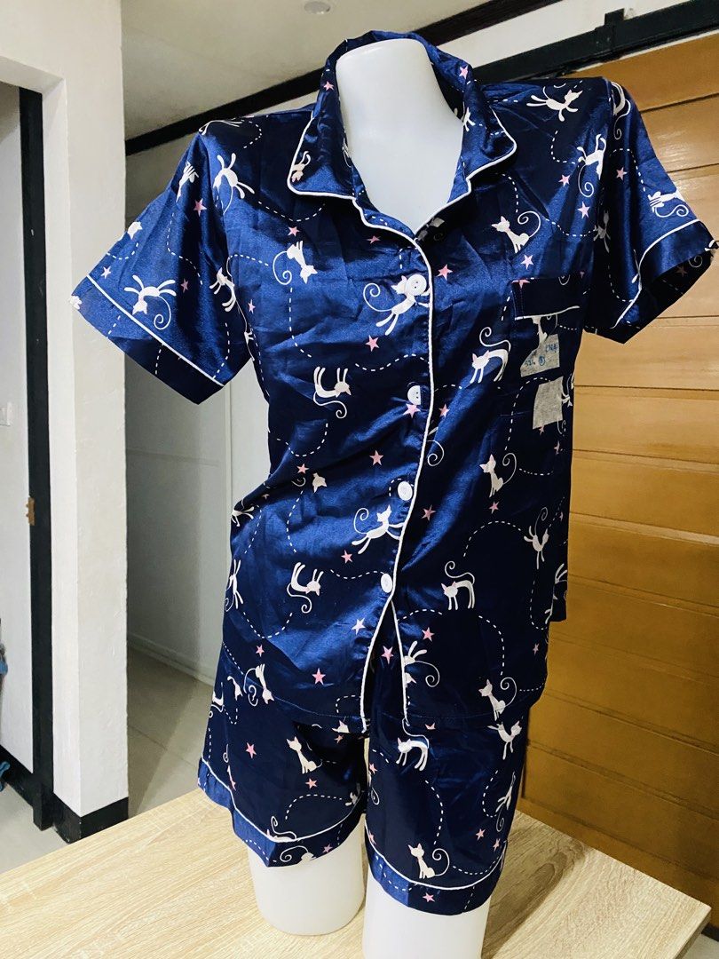 Bundle Satin Pajama Set - Short Sleeve Top & Shorts (Category: Undergarments & Loungewear) located in Indang. Submitted by matilde.sshop (Listing ID 1459885425, Image 1). Description: - Cute satin pajama set - Available in navy blue (cat print) or black (Mickey Mouse print) - Short sleeves and matching shorts - Button-up top with a convenient pocket - Super comfortable for sleeping or lounging - Makes a great gift idea!.