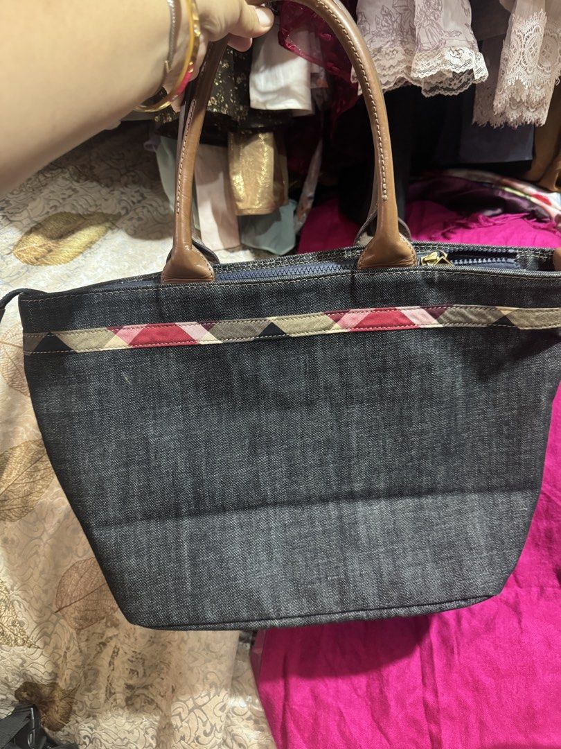 Burberry (Category: Luxury Bags & Wallets) located in Manila. Submitted by wildbear.e10374 (Listing ID 1459741080, Image 3). Description: Burberry Blue Label crest bridge good quality and washable 100% good quality. Handle leather made with code number 01570-02 with zipper YKK-vision: .