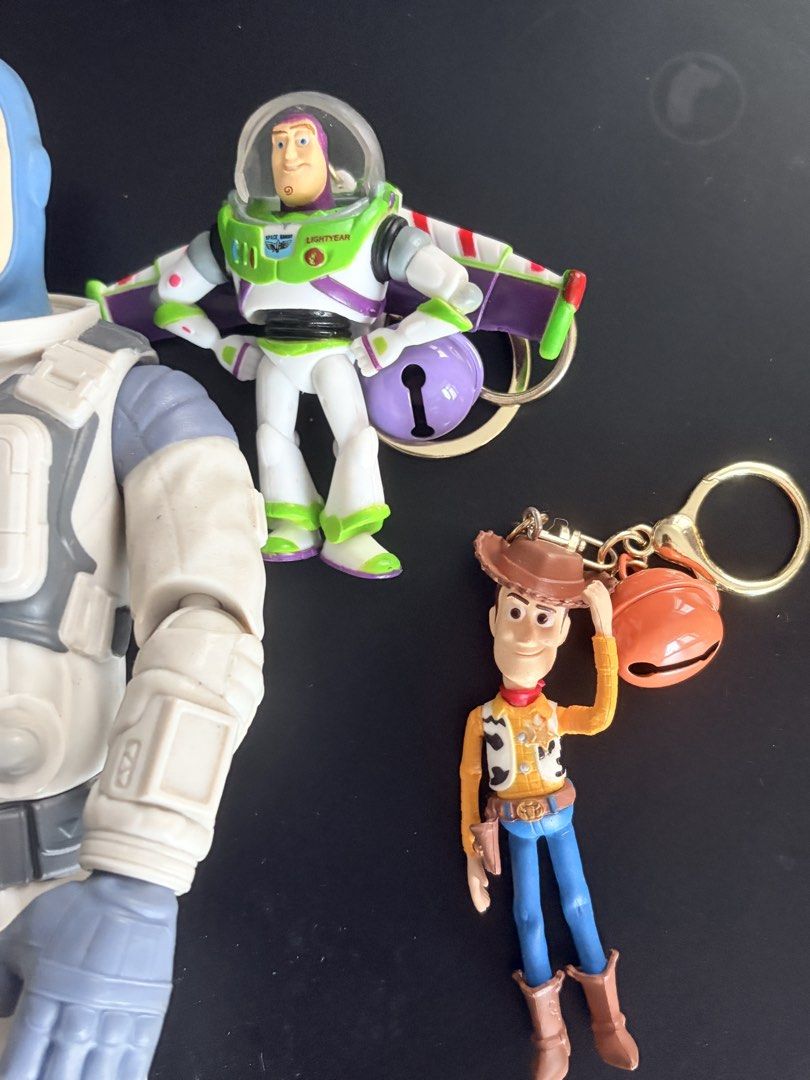 Buzz Lightyear and Woody Toy Figures with Keychains (Category: Figurines & Statues) located in Manila. Submitted by boccy2023 (Listing ID 1459898842, Image 2). Description: Set includes Buzz Lightyear and Woody figures. php 500.