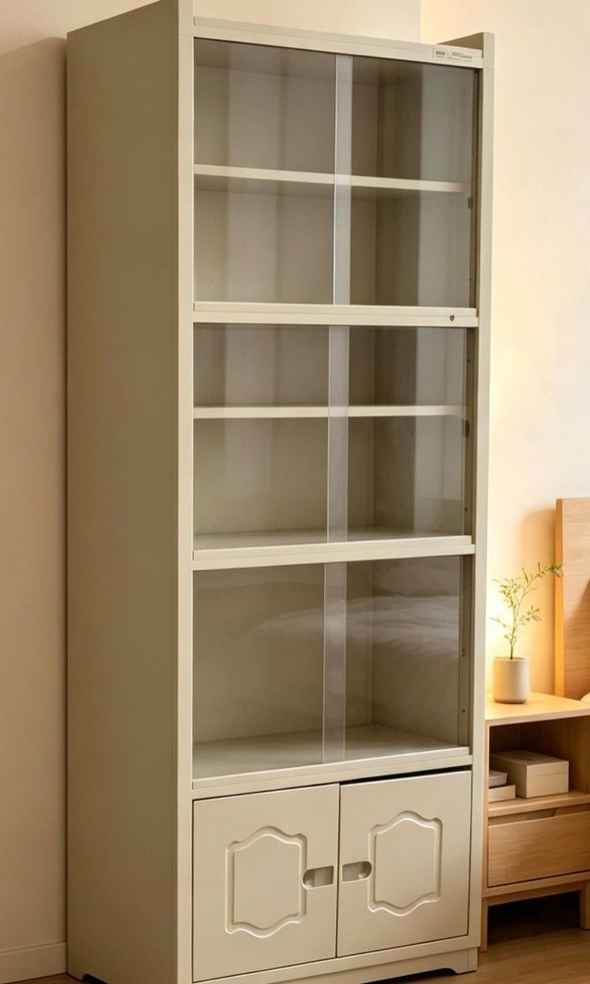 CABINET GLASS TYPE (Category: Home Improvement Tools & Accessories) located in Manila. Submitted by maxine_27 (Listing ID 1459805140, Image 1). Description: Slim tall cabinet — ESTIMATE: 120cm × 35cm × 40cm, cream white, glass front, solid & sturdy, smooth drawers. Perfect for bedside/corner/narrow spaces! Good condition. LOWEST PRICE IN THE MARKET! ZOEEY BRAND ❤️ 2ND PIC ISSUE: sa door na isa kasi natatanggal napo sya pero fixable po. 3rd pic: O
