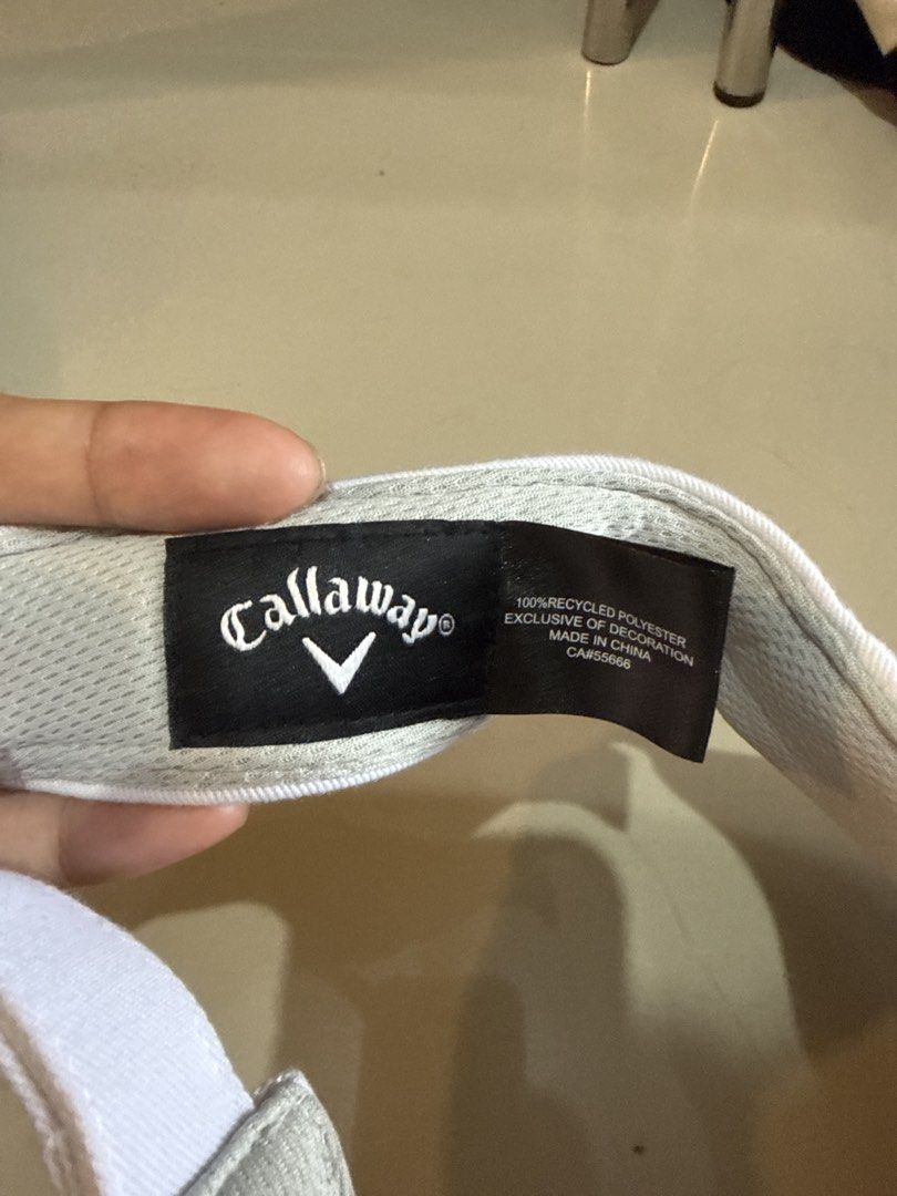 Callaway Golf Visor - White (Category: Caps & Hats) located in Manila. Submitted by hiiipurple (Listing ID 1459766074, Image 3). Description: - White Callaway golf visor - Embroidered Callaway logo on front - Odyssey and Chrome Soft branding on sides - Made from 100% recycled polyester - Ideal for sunny days on the golf course.
