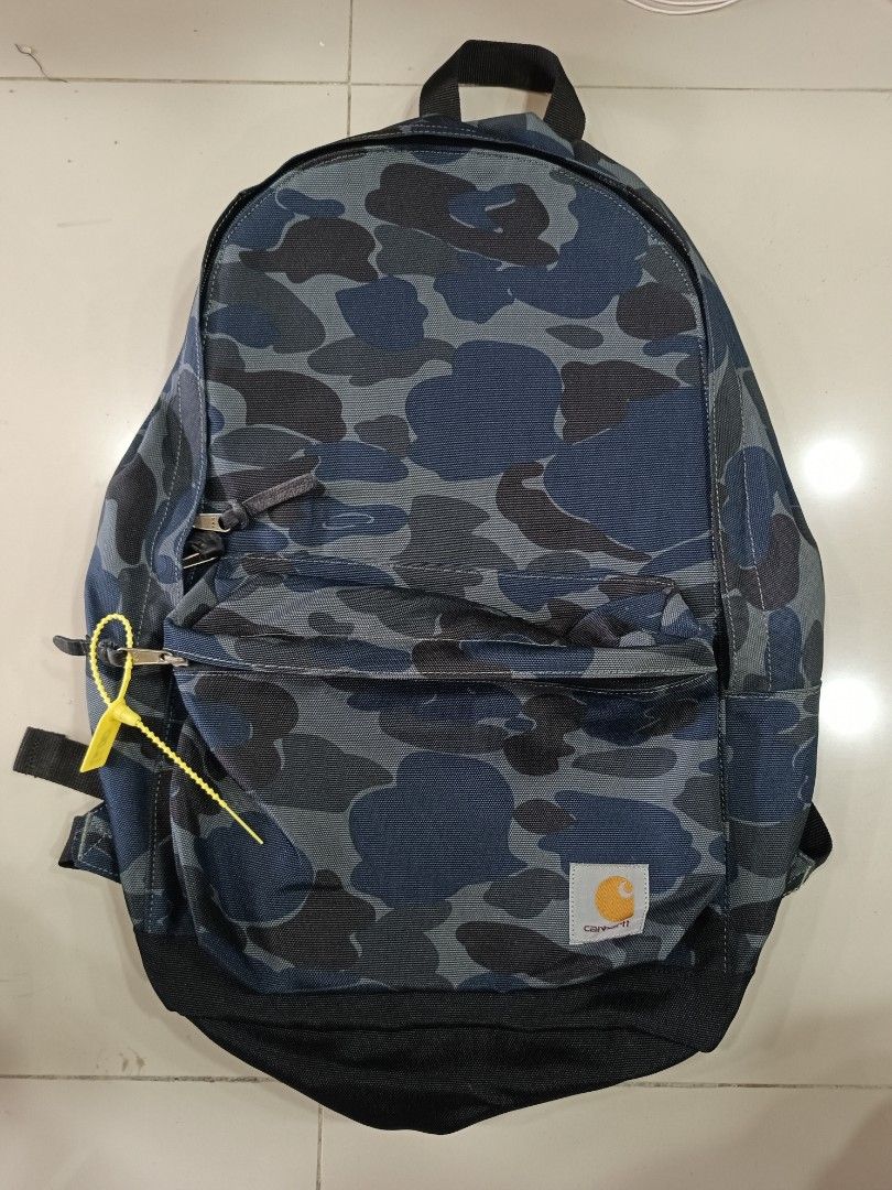 Carhartt Camo Cordura Backpack (Category: Backpacks) located in Manila. Submitted by silent_boss_g (Listing ID 1459697235, Image 1). Description: - Durable Carhartt backpack in blue camouflage. - Made with tough Cordura fabric. - Multiple zippered compartments for organization. - Internal pocket included. - Smooth YKK zippers. - Padded shoulder straps for comfort. - Ideal for daily use or travel..