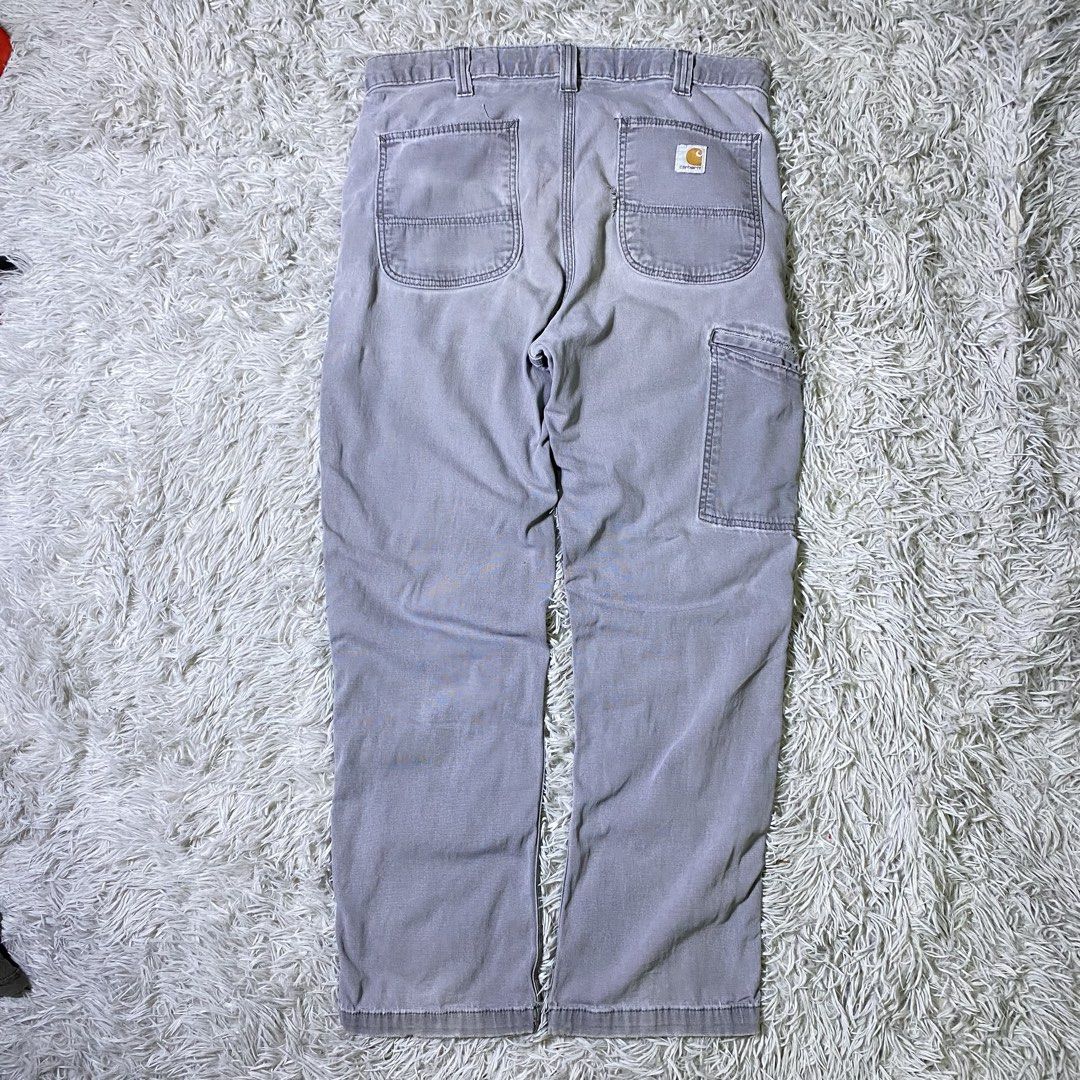 Carhartt Relaxed Fit Cargo Pants Grey (Category: Jeans) located in Manila. Submitted by 14hunn1d_ (Listing ID 1459768263, Image 1). Description: C@rhartt Relaxed Fit Pants Waist: 36 Length: 42.5 Thigh: 12.5 Leg opening: 9 Issue: Ripped parts, Distress Price: 600.