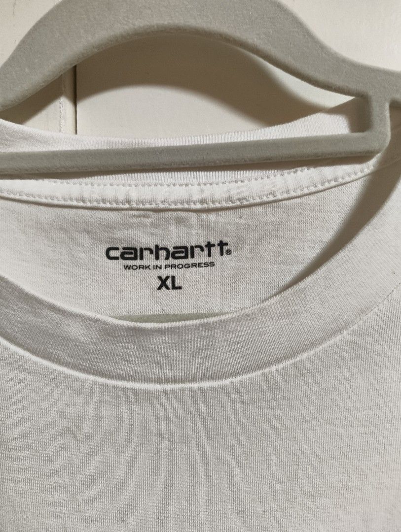 Carhartt Work Wip (Category: Tshirts & Polo Shirts ) located in San Pedro. Submitted by madvillainkicks (Listing ID 1459728903, Image 3). Description: White Carhartt WIP tee. Size XL. Has a small hole on the front. Check photos for details. Good for casual wear..