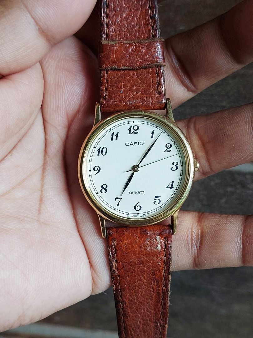 Casio Quartz Watch with Brown Leather Strap (Category: Women's Watches) located in Batangas. Submitted by vintageanddainty (Listing ID 1459695308, Image 1). Description: - Classic Casio analog watch - White face with gold-tone bezel - Hour, minute, and second hands - Brown leather strap - Reliable quartz movement - Ideal for everyday wear.