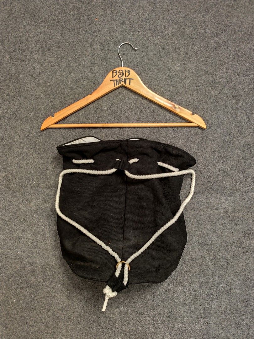 Chanel Black Drawstring Bag (Category: Luxury Bags & Wallets) located in Cordova. Submitted by bsb.streetluxvintage.clothing (Listing ID 1459783779, Image 2). Description: - Authentic Chanel drawstring bag - Iconic Chanel logo on the front - Interior lining with repeating Chanel logo pattern - White rope handles for drawstring closure - Ideal for everyday use or travel accessory.