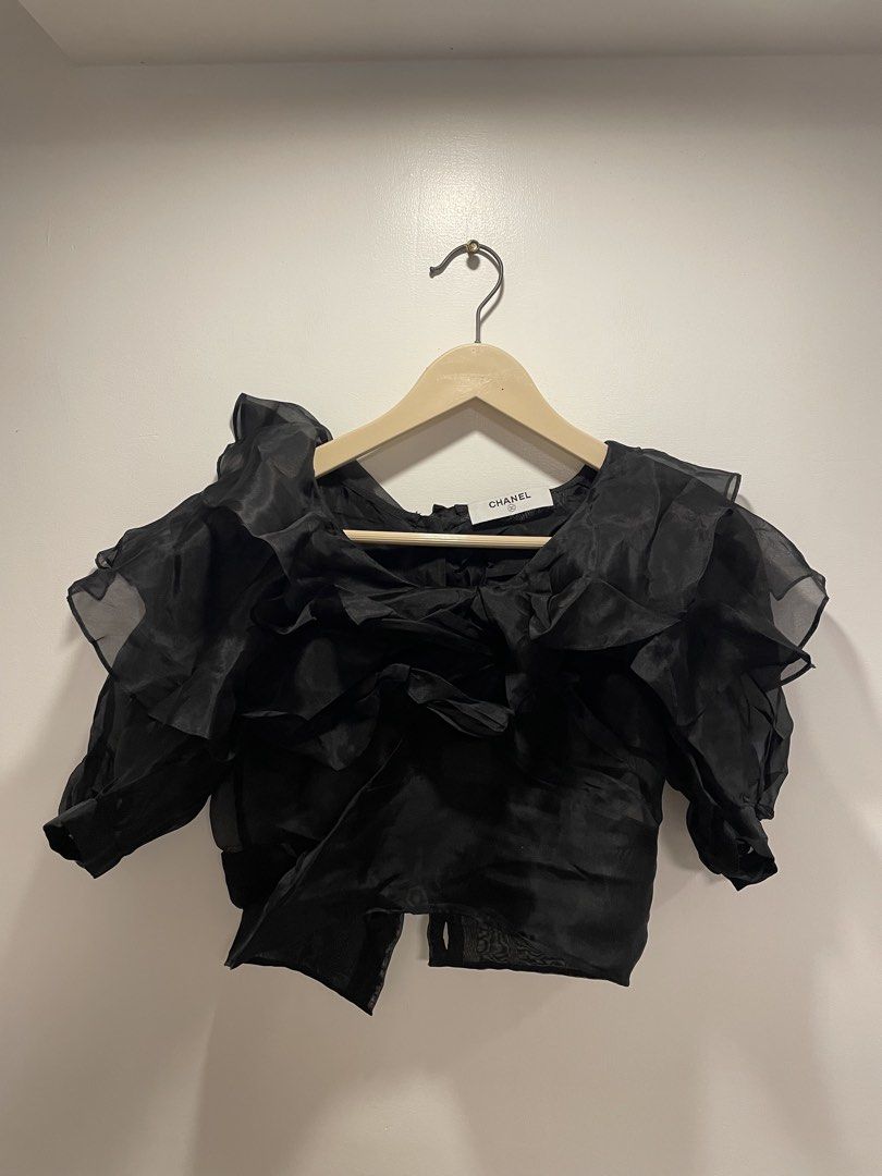 Chanel Black Ruffled Top (Category: Shirts) located in Bacolod City. Submitted by moboandmoga (Listing ID 1459790896, Image 2). Description: Chanel Black Ruffled Top Size: Small to Medium frame Excellent Condition!.