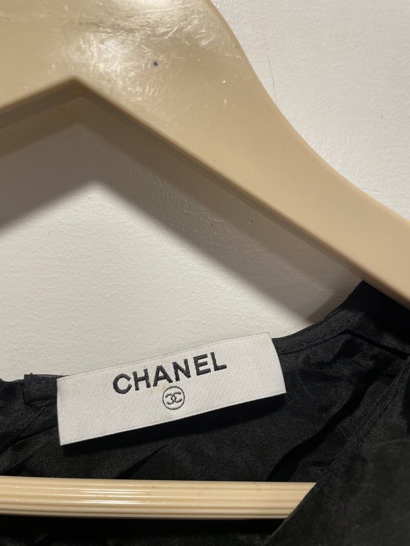 Chanel Black Ruffled Top (Category: Shirts) located in Bacolod City. Submitted by moboandmoga (Listing ID 1459790896, Image 3). Description: Chanel Black Ruffled Top Size: Small to Medium frame Excellent Condition!.