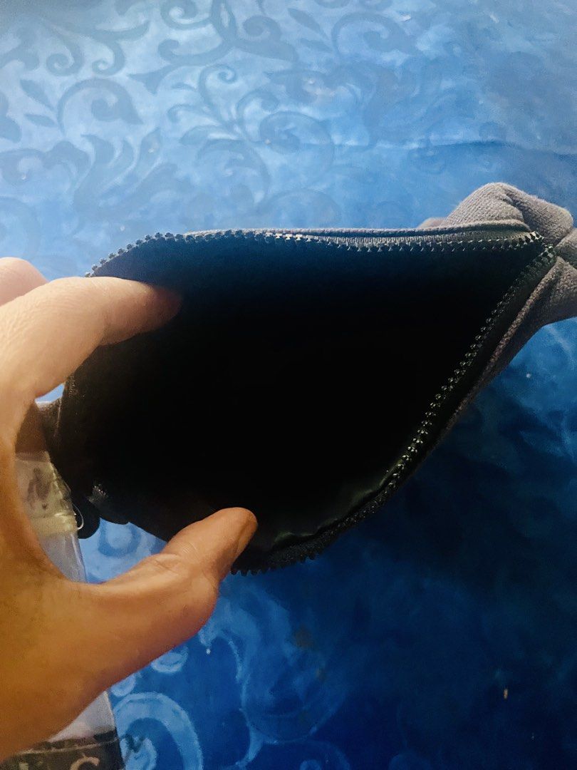 Chanel Cosmetic Pouch (Category: Looking For) located in Caloocan City. Submitted by hardestea2026 (Listing ID 1459885565, Image 3). Description: - Authentic Chanel pouch - Dark brown canvas material - Zipper closure with Chanel logo charm - Black interior - Ideal for makeup or small essentials - Clean inside and out - Great for travel or daily use.
