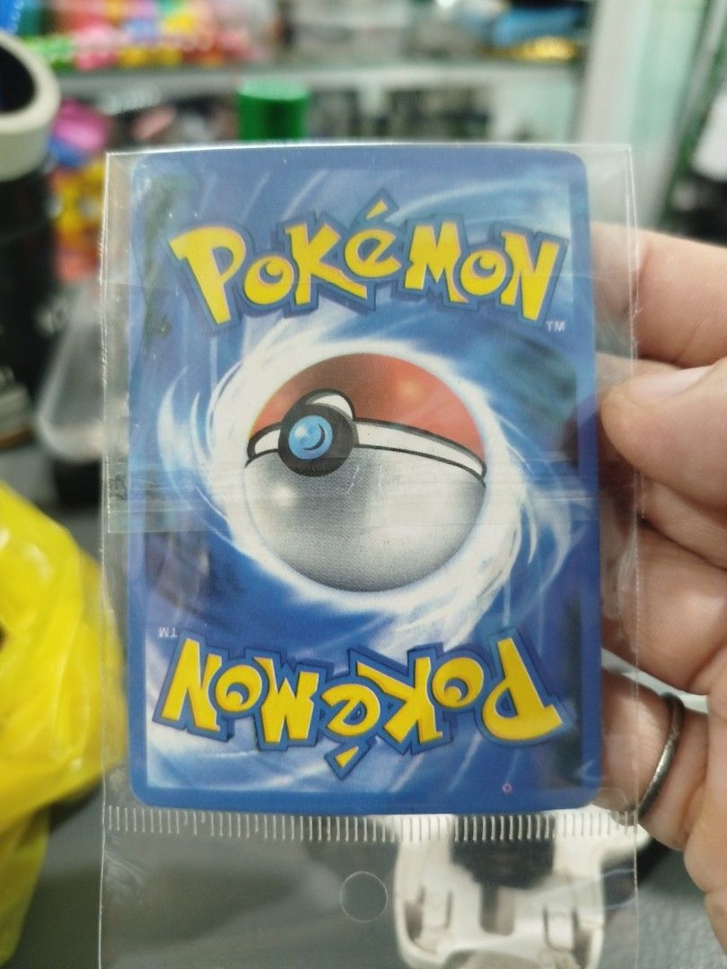 Copy Charizard EX Pokemon Card 12/106 (Category: Raw Singles) located in Subic. Submitted by regiedaniel01 (Listing ID 1459842565, Image 2). Description: - Rare Charizard EX Pokemon Card - Card Number: 12/106 - Moves: Wing Attack, Combustion Blast - Ideal for collectors - Don't miss out on this rare find!.