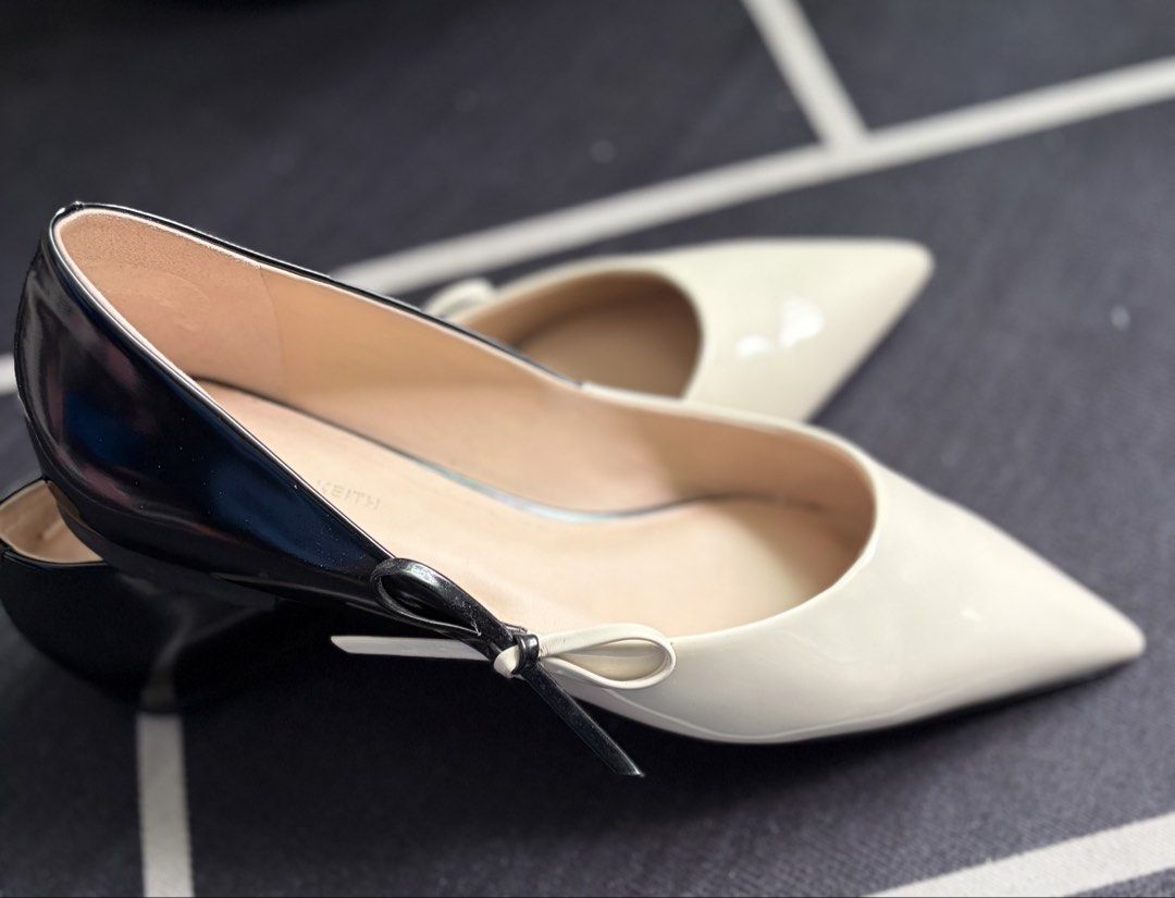 Charles & Keith Black and White Pointed Toe Flats (Category: Flats & Sandals) located in Manila. Submitted by puffofclouds (Listing ID 1459747070, Image 3). Description: - Brand: Charles & Keith - Style: Pointed toe flats - Design: Black and white color block - Detail: Small ribbon on the side - Comfort: Ideal for everyday wear - Condition: Please check photos for details Note: It only has some sticky residue left on the inside, but it can be eas