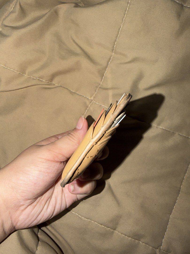 Charles & Keith Quilted Card Holder Tan (Category: Wallets & Card holders) located in Valenzuela. Submitted by royalstone_05 (Listing ID 1459754264, Image 2). Description: - Charles & Keith Tan Quilted Card Holder - Compact and fits multiple cards - Perfect for everyday use - Fits easily in pockets or small bags - Shows some signs of wear on the edges.