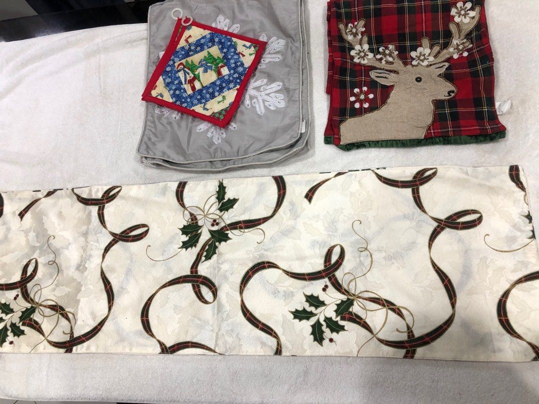 Christmas Table Runner, Pot Holders, & Reindeer Decor (Category: Other Home Decor) located in Manila. Submitted by janmichael26601 (Listing ID 1459766575, Image 2). Description: Selling Aspack - Festive Christmas decor set - Cream table runner with holly and ribbon design - Grey pillow cover featuring a large snowflake - Two square pot holders with a cute snowman pattern - Red plaid table runner adorned with a reindeer applique - Ideal for creati