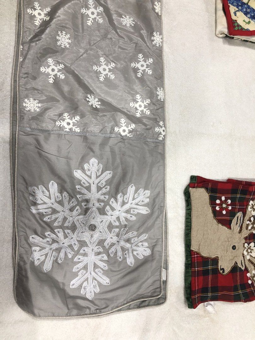 Christmas Table Runner, Pot Holders, & Reindeer Decor (Category: Other Home Decor) located in Manila. Submitted by janmichael26601 (Listing ID 1459766575, Image 3). Description: Selling Aspack - Festive Christmas decor set - Cream table runner with holly and ribbon design - Grey pillow cover featuring a large snowflake - Two square pot holders with a cute snowman pattern - Red plaid table runner adorned with a reindeer applique - Ideal for creati