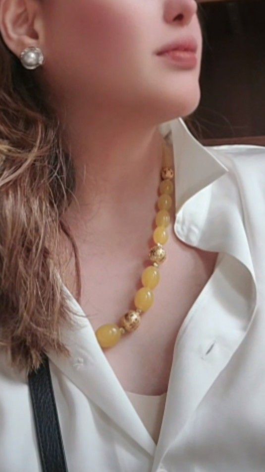 Citrine Necklace (Category: Necklaces) located in Quezon City. Submitted by carahonasan (Listing ID 1459811437, Image 1). Description: - Antique - Citrine yellow necklace - Features gold-toned accent beads - Adds a pop of color to any outfit - Perfect for casual or formal wear - Unique statement piece.
