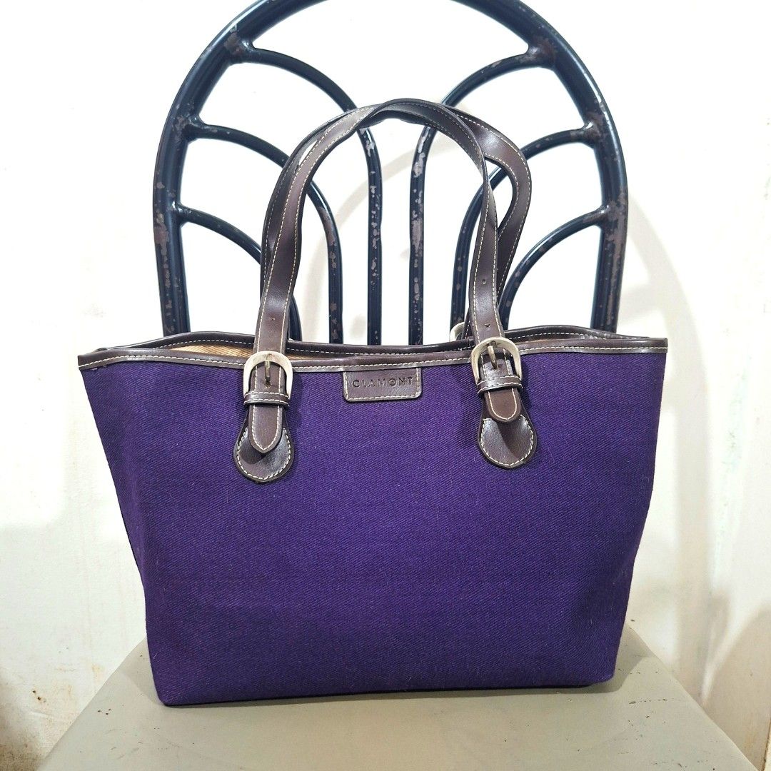 Clamont Purple Canvas Medium Tote Bag (Category: Tote Bags) located in Cagayan de Oro. Submitted by langscloset (Listing ID 1459727839, Image 2). Description: medium size tote bag. brand is Clamont. adjustable strap handle. bigay ng tita ko from Japan. like new no issue. add P85 lng for sf :).